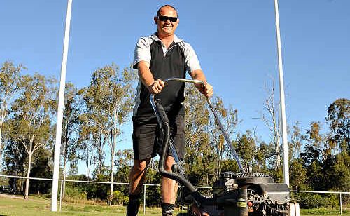 GAME ON: Gympie AFL Club president Glen Warren prepares the field ahead of today’s final clash between Nambour and Bribie Island. GAME ON: Gympie AFL Club president Glen Warren prepares the field ahead of today’s final clash between Nambour and Bribie Island.